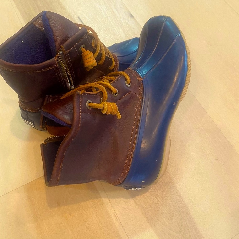 Sperry leather navy duck boots.